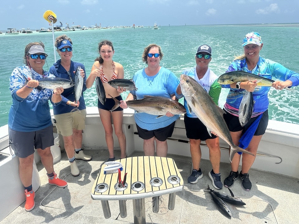 Penny and Jen Jacobus, Pinecrest, FL; Isabella and Jolene Chandler, Jacksonville, FL and Kim Royal and Lachelle Reece, Orlando FL on KK IV.    Ladies, Let’s Go Fishing Screamin’ Reels tournament