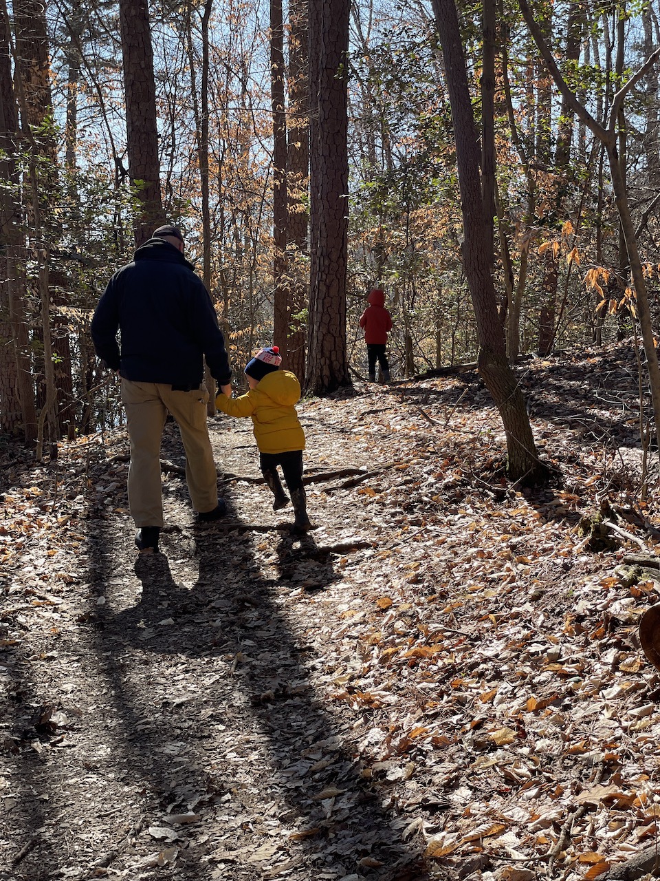 boys with papa in woods