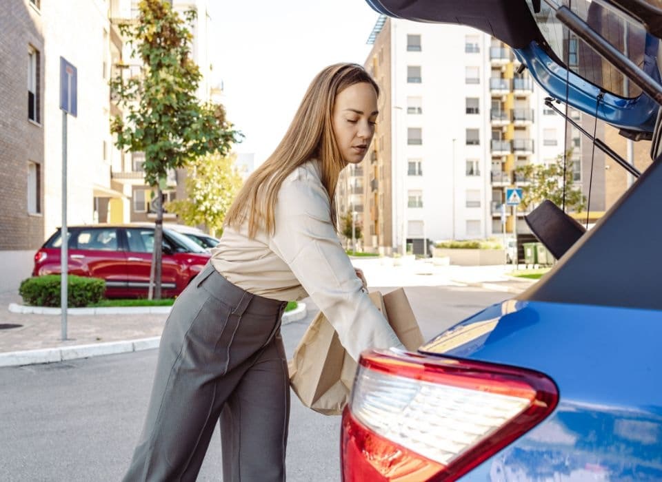 putting-packages-in-car holiday shopping