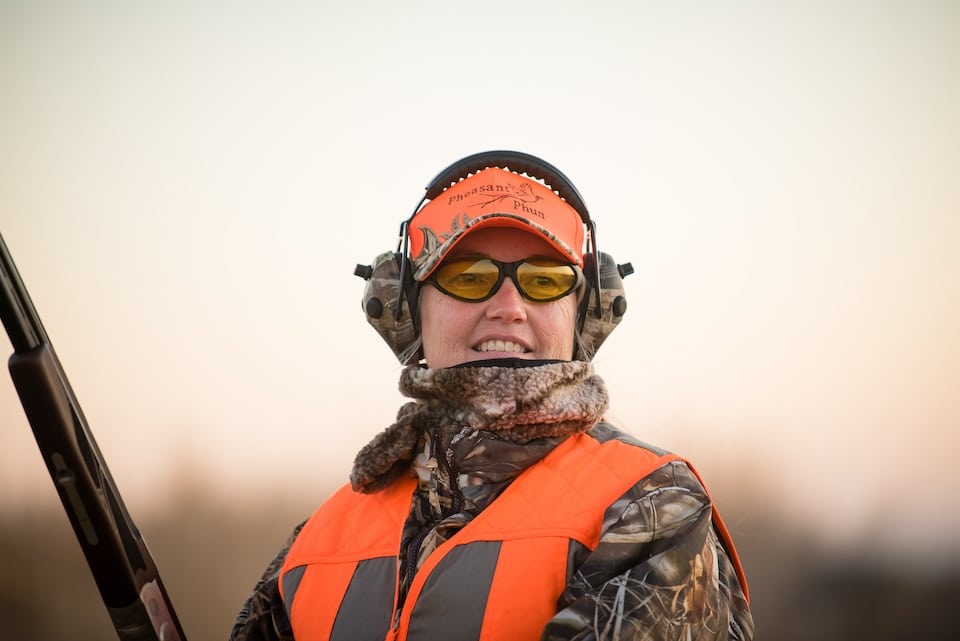 Woman hunting pheasant phun