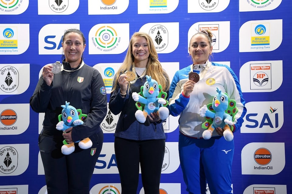 Sam Simonton, center, won gold in Women’s Skeet at the 2024 ISSF World Cup Final. Photo courtesy of the ISSF