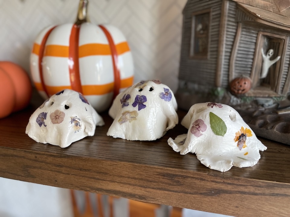 clay ghosts on shelf