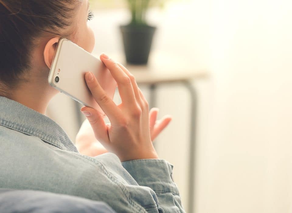 woman-on-phone self-defense needs