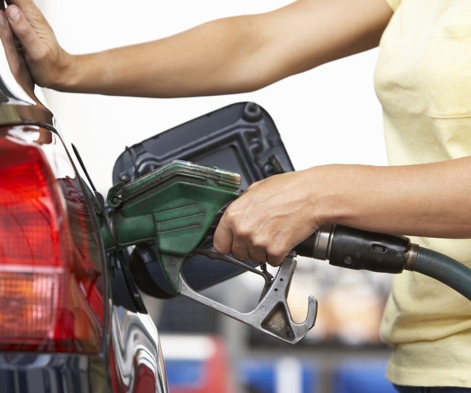 woman pumping gas