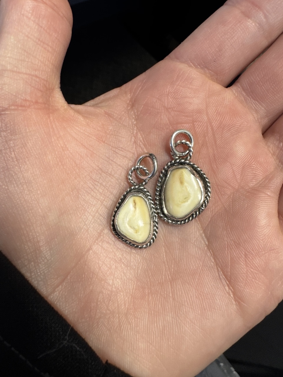 pendants made from elk ivory