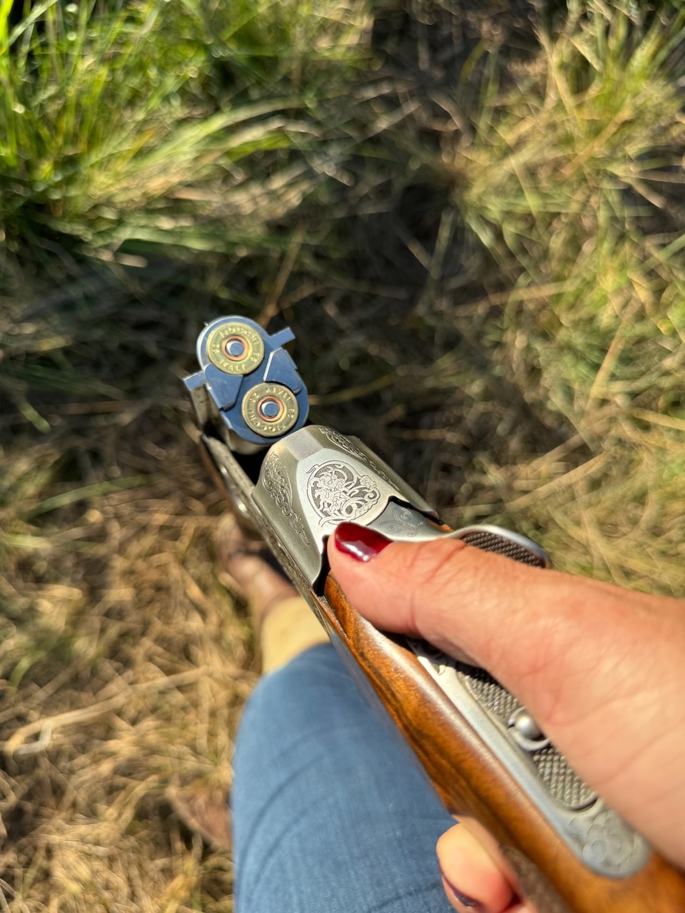 Woman holding Krieghoff shooting doves