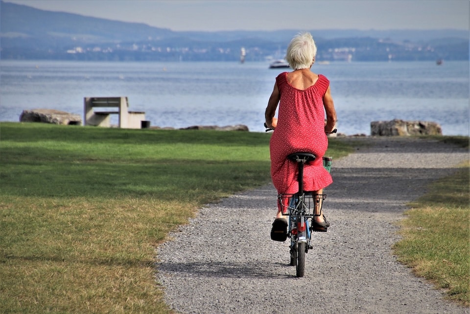 older woman riding a bike