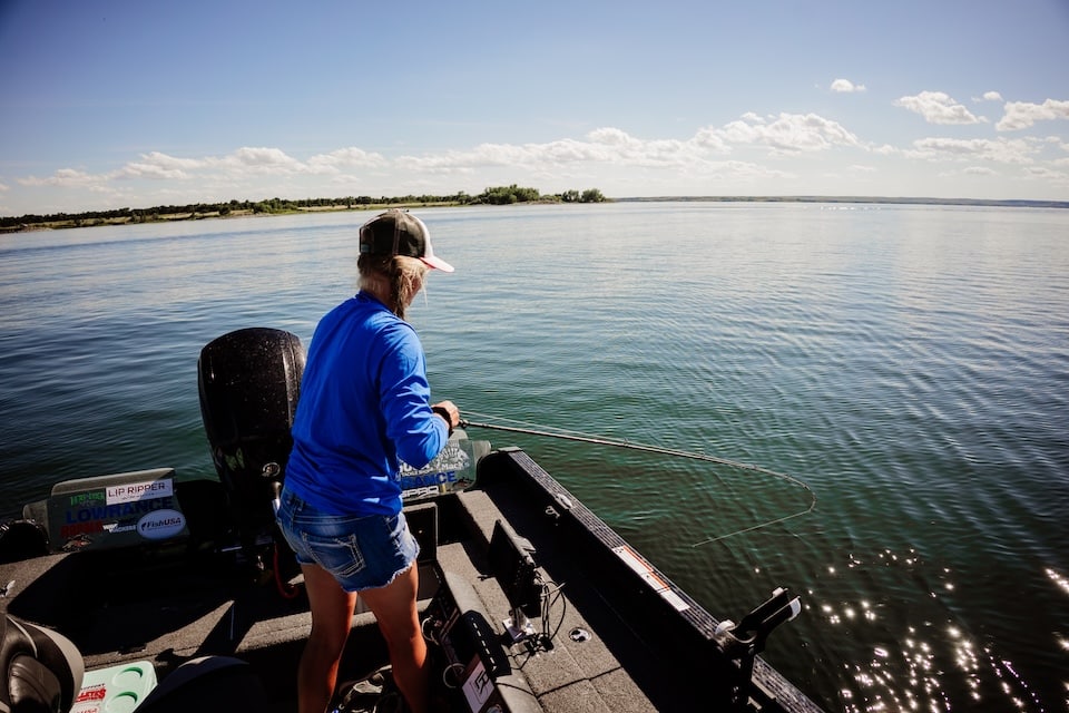 Woman Reeling in Catch on Lake Oahe South Dakota anglers